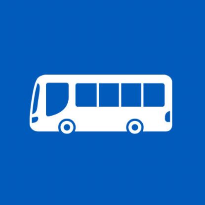 graphic logo of a white bus with 5 windows along the side, on a royal blue background.